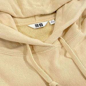 This is a hoodie sweater from Uniqlo,size M,Tan